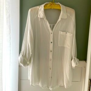 Women’s white light weight hip length oversized blouse